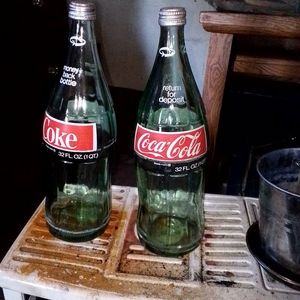 Vintage unopened coke bottles